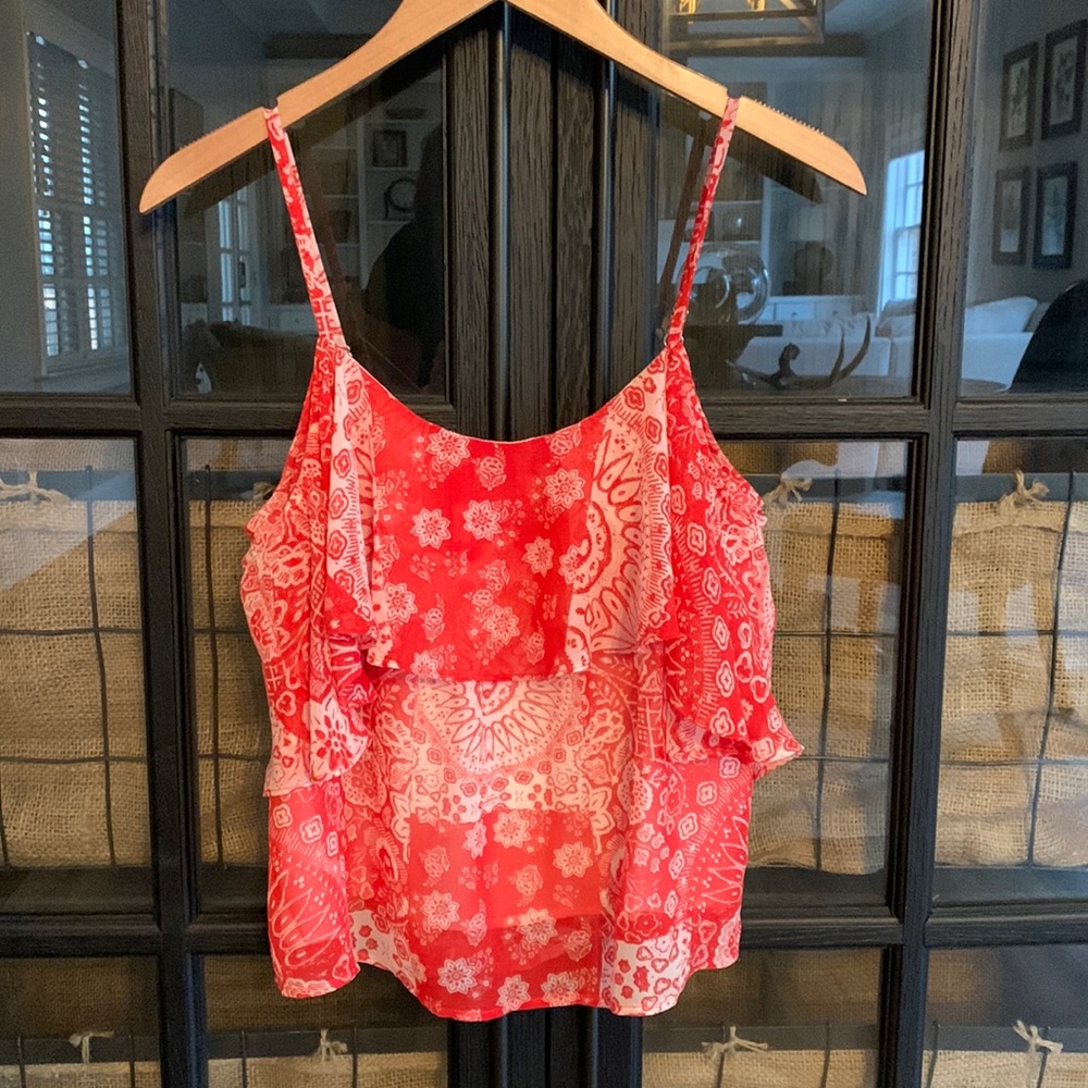 Red & white sheer printed top with a white lining. Size XS.